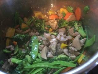 chicken with broc in pan